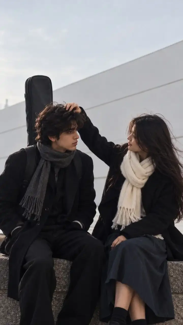 Winter stone ledge couple wool coats messy hair touch prompt for Google Gemini